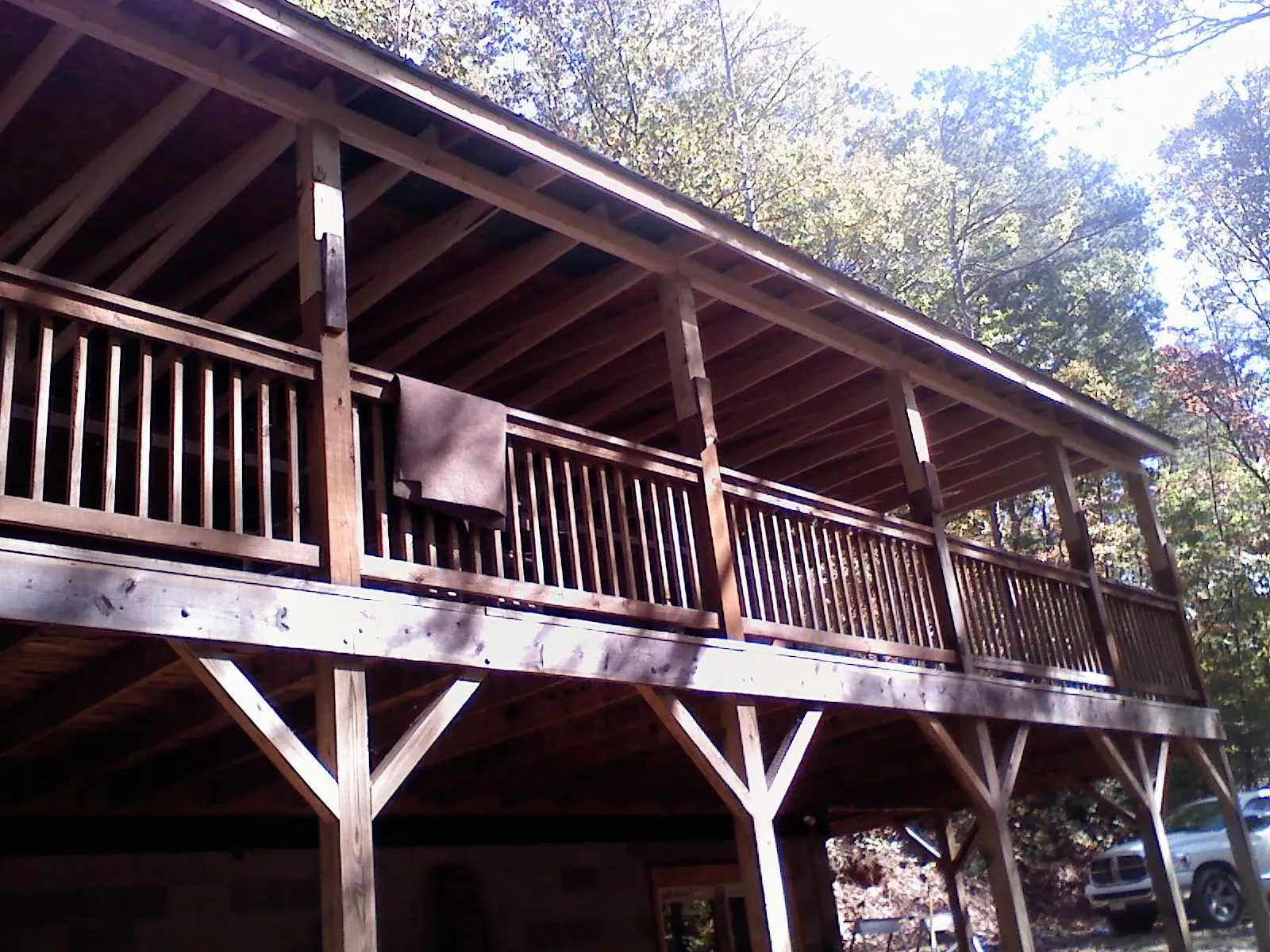 Timber framing under a new elevated porch and deck — Roof Leak Repair in Forest by Roofing Brothers